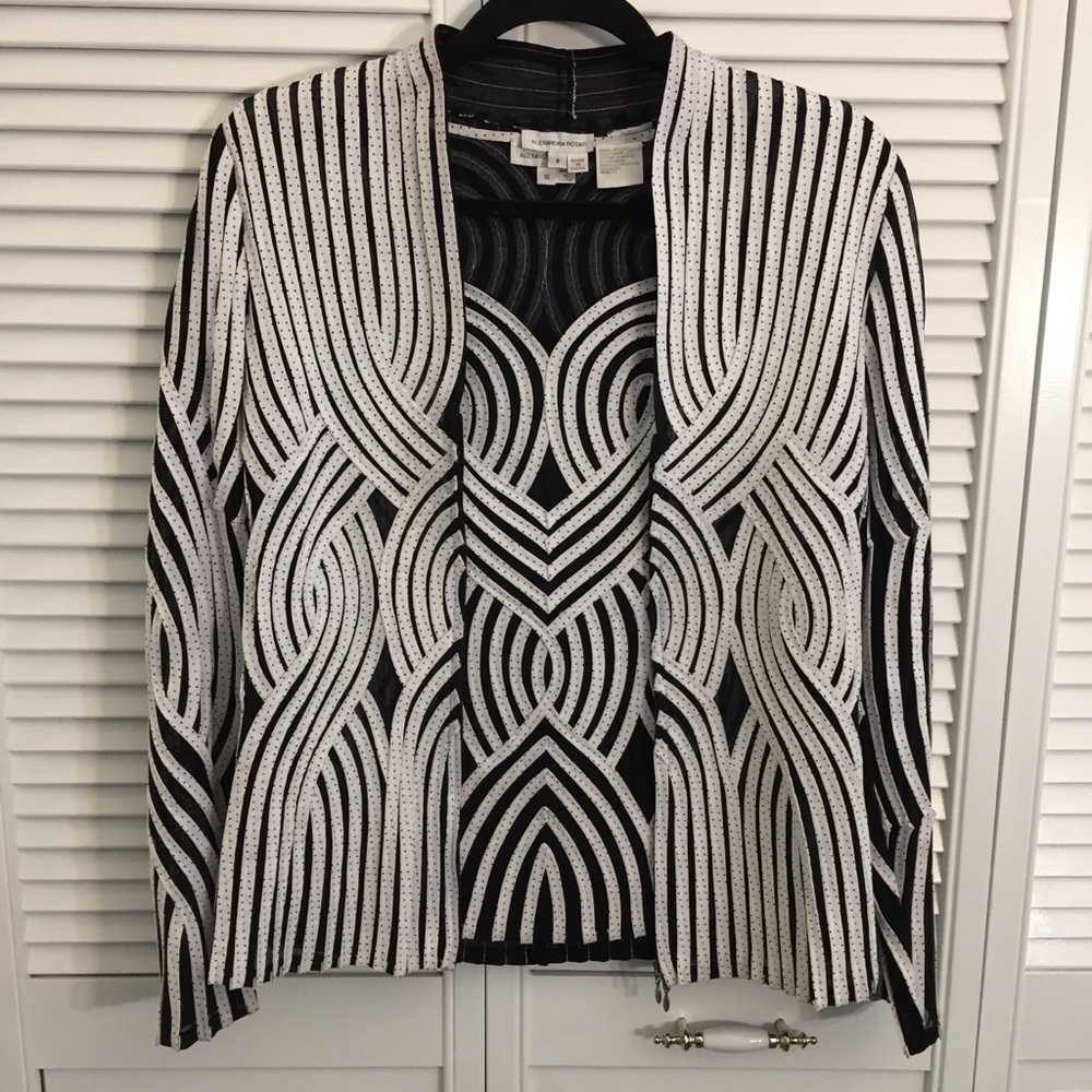Women’s dress jacket with sleeveless shell.